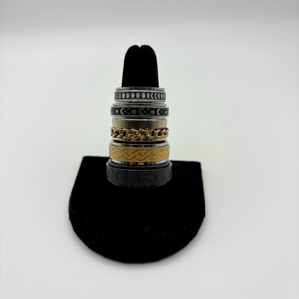 Stylish Black and Gold Ring Spinner Rings